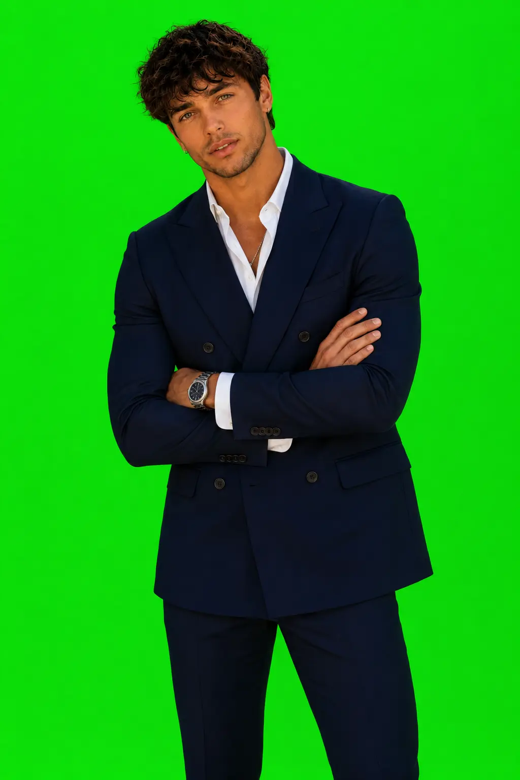 Yury in a navy suit during a studio session